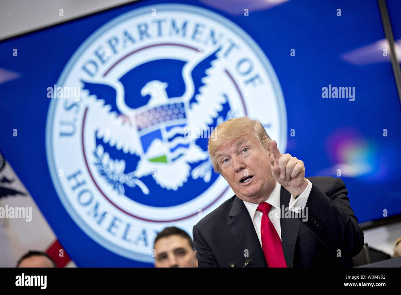 U.S. President Donald Trump speaks while participating in a Customs and Border Protection (CBP) roundtable discussion after touring the CBP National Targeting Center in Sterling, Virginia, U.S., on Friday, Feb. 2, 2018. Trump is looking to ratchet up pressure on lawmakers to consider the immigration proposal he unveiled in Tuesday's State of the Union using the visit as an opportunity to again argue his proposal would bolster the country's borders.   Photo by Andrew Harrer/UPI Stock Photo
