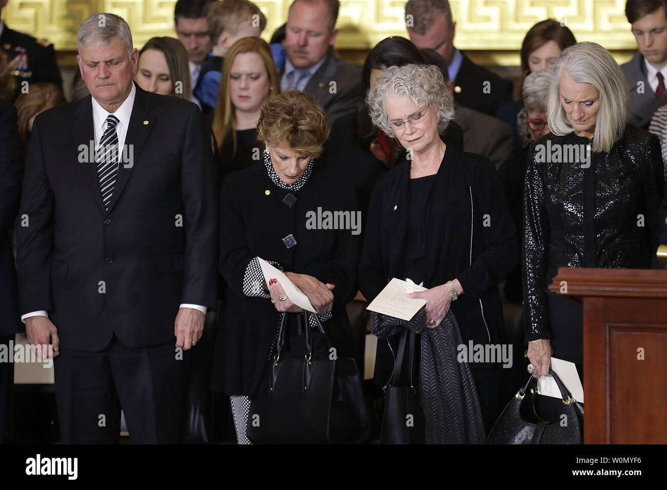 Christian evangelist and Southern Baptist minister Billy Graham's children (L-R) Franklin Graham, Gigi Graham, Ruth Graham and Anne Graham Lotz attend a ceremony to honor their father as his  body lies in honor in the U.S. Capitol Rotunda February 28, 2018 in Washington, DC. A spiritual counselor for every president from Harry Truman to Barack Obama and other world leaders for more than 60 years, Graham died February 21 at the age of 99.  Photo by Chip Somodevilla/UPI Stock Photo