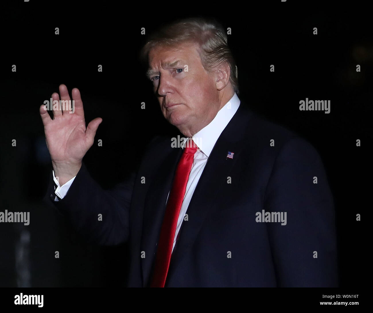 President Donald Trump waves as he walks to the White House after arriving on Marine One on May 29, 2018 in Washington, DC. President Trump traveled to Nashville, Tennessee to attend a campaign rally for Rep. Marsha Blackburn who is running for outgoing Sen. Bob Corker's Senate seat.     Photo by Mark Wilson/UPI Stock Photo
