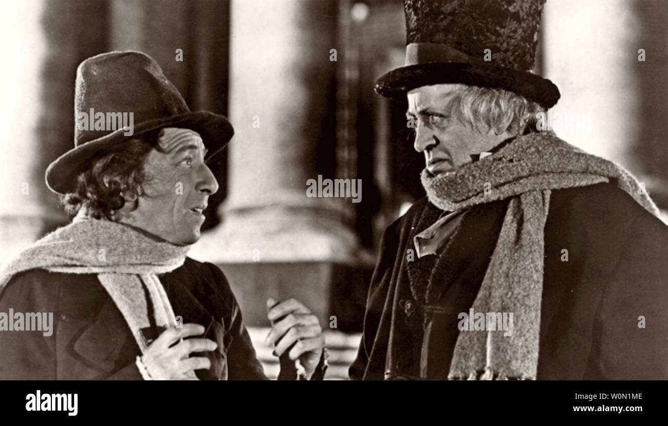 SCROOGE 1951 United Artists film with Alastair Sim at right and Mervyn Johns Stock Photo