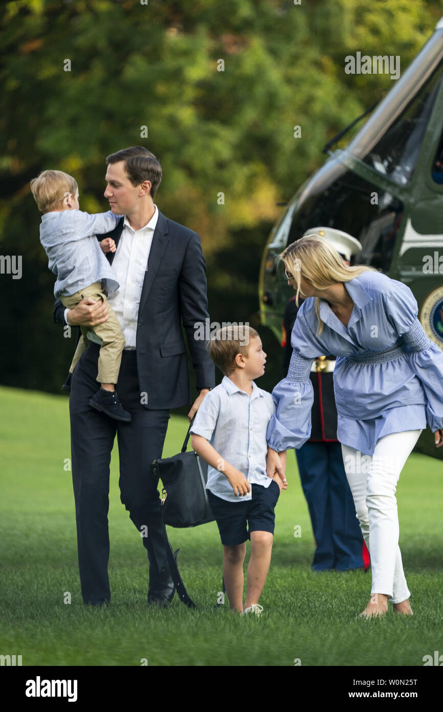 Jared Kushner (C-L) and Ivanka Trump (R) walk with their children Theodore (L) and Joseph (C-R) across the South Lawn as they return from a weekend stay in Bedminster, New Jersey at the White House in Washington, DC on July 29, 2018. Earlier in the day, the U.S. President Donald J. Trump once again went after the media on Twitter, calling them the 'enemy of the people.'   Photo by Jim Lo Scalzo/UPI Stock Photo