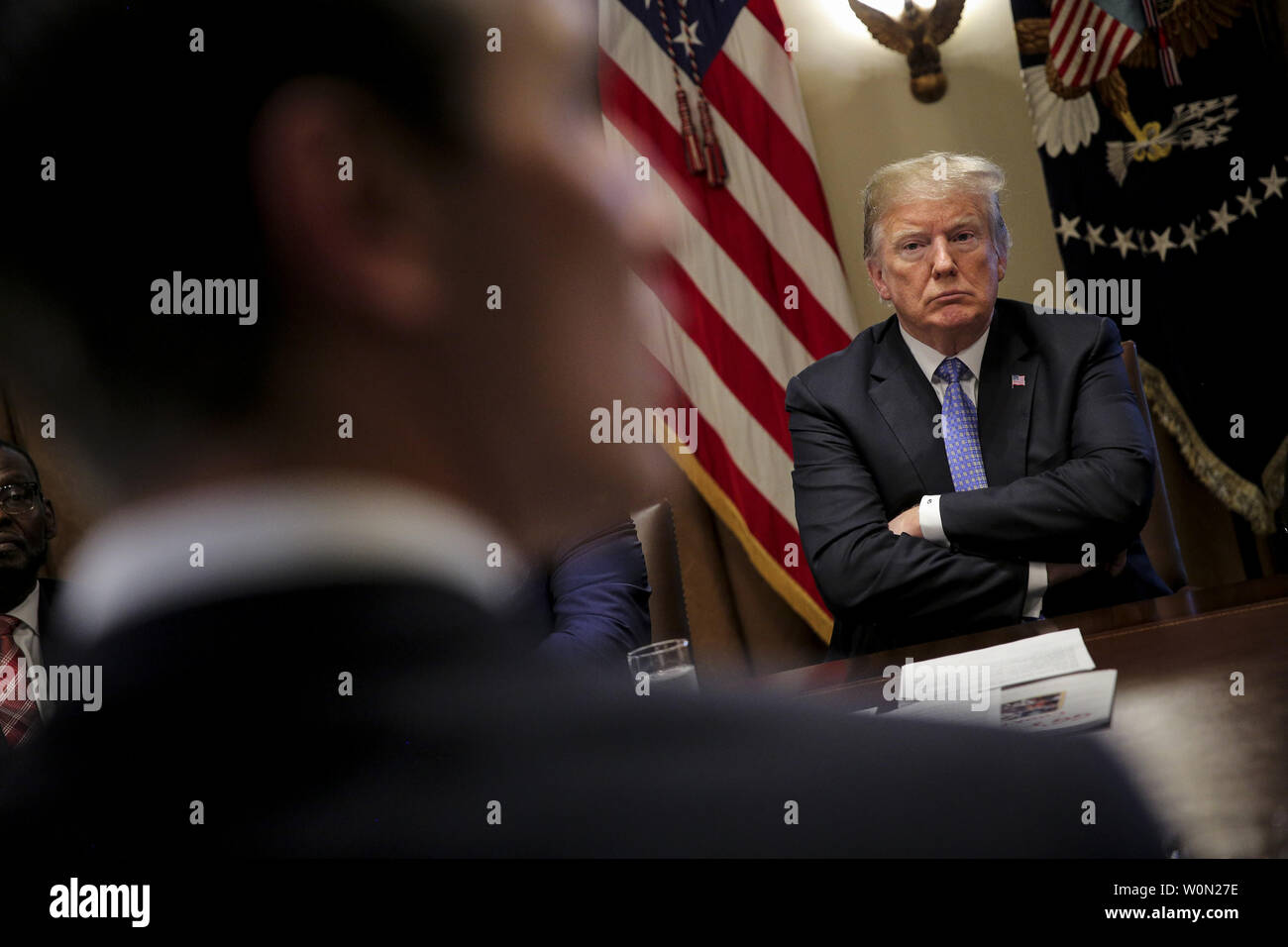 President Donald Trump looks as Jared Kushner, senior adviser to the president, talks during a meeting President Donald Trump speaks during a meeting with inner city pastors in the Cabinet Room of the White House on August 1, 2018 in Washington, DC.  They discussed prison reform and other issues.   Photo by Oliver Contreras/UPI Stock Photo