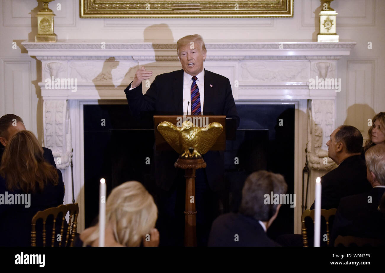 U.S. President Donald Trump delivers remarks during a dinner for ...