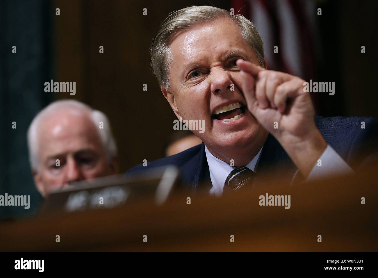 Senate Judiciary Committee member Sen. Lindsey Graham (R-SC) shouts while questioning Judge Brett Kavanaugh during his Supreme Court confirmation hearing in the Dirksen Senate Office Building on Capitol Hill September 27, 2018 in Washington, DC. Kavanaugh was called back to testify about claims by Christine Blasey Ford, who has accused him of sexually assaulting her during a party in 1982 when they were high school students in suburban Maryland.  Photo by Win McNamee/UPI Stock Photo