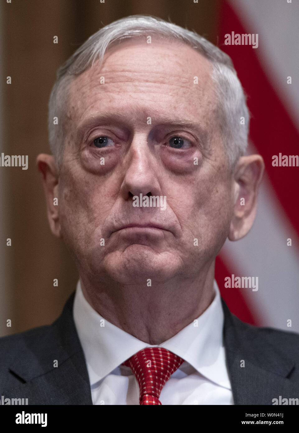 United States Secretary of Defense James Mattis listens as US President Donald J. Trump makes a statement to the media as he prepares to receive a briefing from senior military leaders in the Cabinet Room of the White House in Washington, DC on Tuesday, October 23, 2018.  The President took questions on the proposed space force, immigration, the caravan and Saudi actions in the killing of Jamal Khashoggi.       Photo by Ron Sachs/UPI Stock Photo