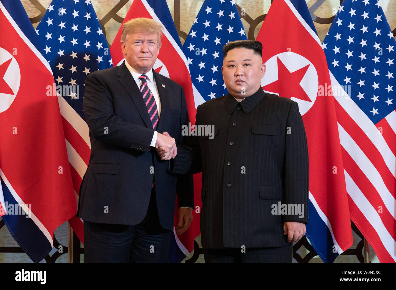 President Donald J. Trump is greeted by Kim Jong Un, Chairman of the State Affairs Commission of the Democratic People’s Republic of Korea, on February 27, 2019, at the Sofitel Legend Metropole hotel in Hanoi, for their second summit meeting. White House Photo by Shealah Craighead/UPI Stock Photo