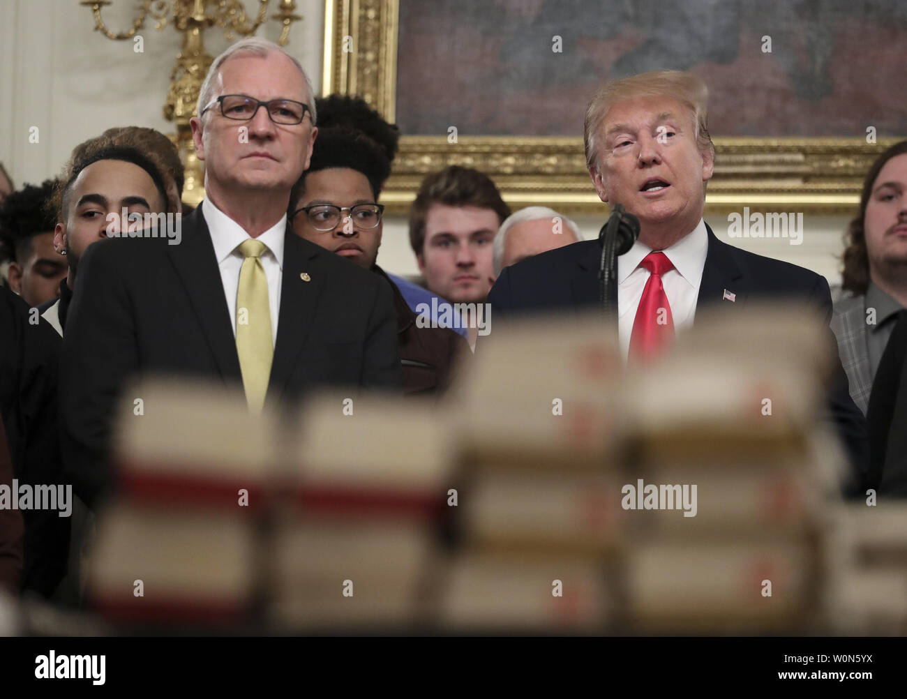 President Donald Trump, speaks behind a table full of McDonald's ...