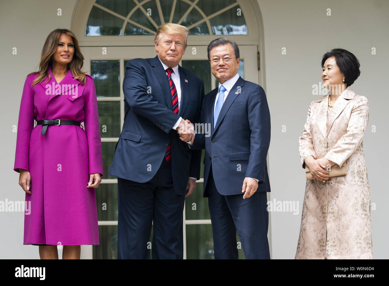 US President Donald J. Trump (C-L) and First Lady Melania Trump (L) welcome Korean President Moon Jae-in (C-R) and Mrs. Kim Jung-sook (R) to the Colonnade of the White House in Washington on April 11, 2019. President Moon is expected to ask President Trump to reduce sanctions on North Korea in an attempt to jump start nuclear negotiations between North Korea and the US.  Photo by Jim Lo Scalzo/UPI Stock Photo