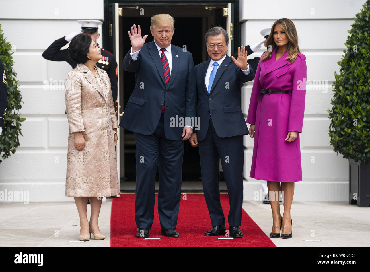 US President Donald J. Trump (C-L) and First Lady Melania Trump (L) welcome Korean President Moon Jae-in (C-R) and Mrs. Kim Jung-sook (R) to the  White House in Washington on April 11, 2019. President Moon is expected to ask President Trump to reduce sanctions on North Korea in an attempt to jump start nuclear negotiations between North Korea and the US.  Photo by Jim Lo Scalzo/UPI Stock Photo