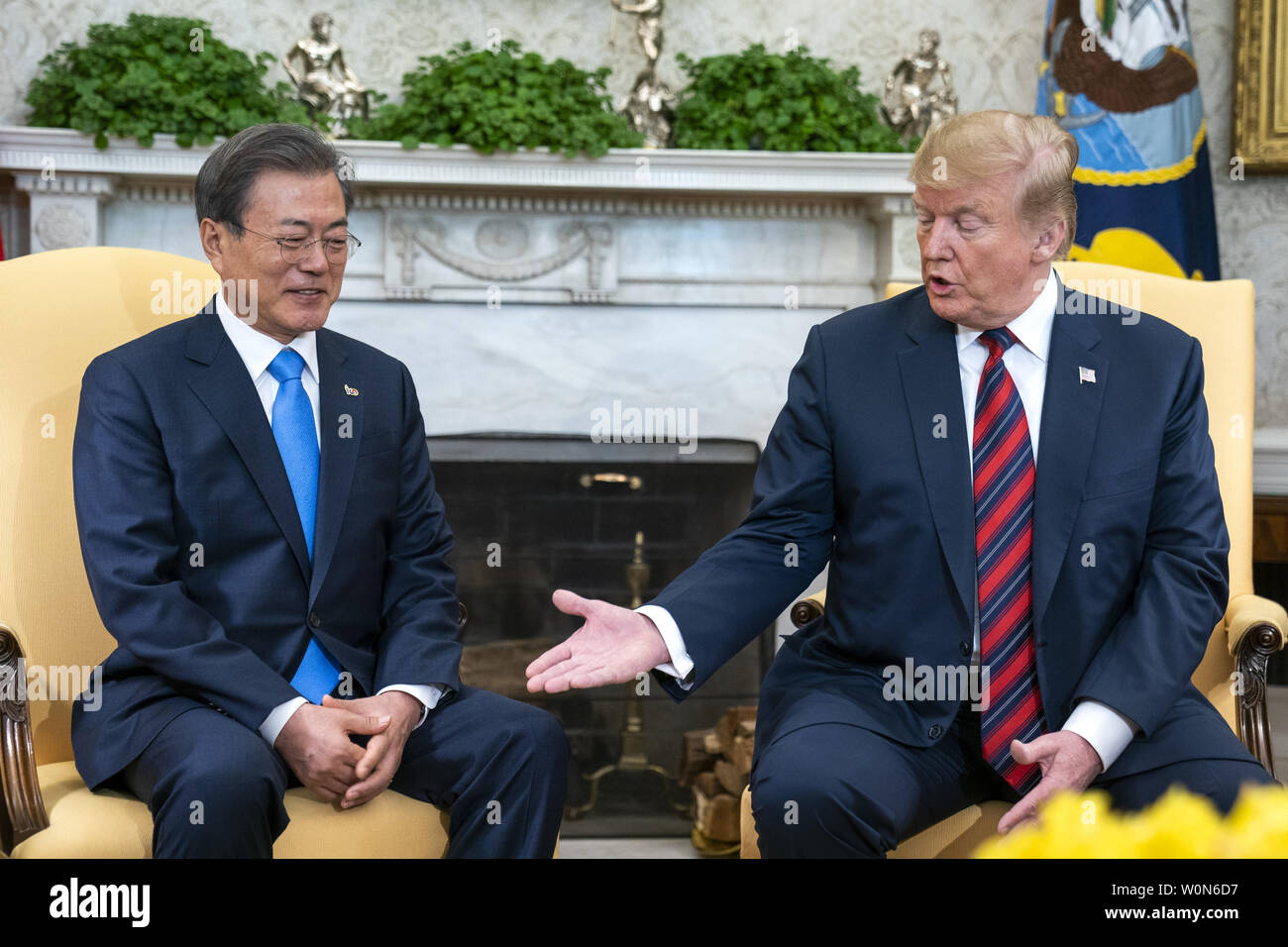 US President Donald J. Trump (R) welcomes South Korean President Moon Jae-in (L) to the Oval Office of the White House White House in Washington on April 11, 2019. President Moon is expected to ask President Trump to reduce sanctions on North Korea in an attempt to jump start nuclear negotiations between North Korea and the US.  Photo by Jim Lo Scalzo/UPI Stock Photo