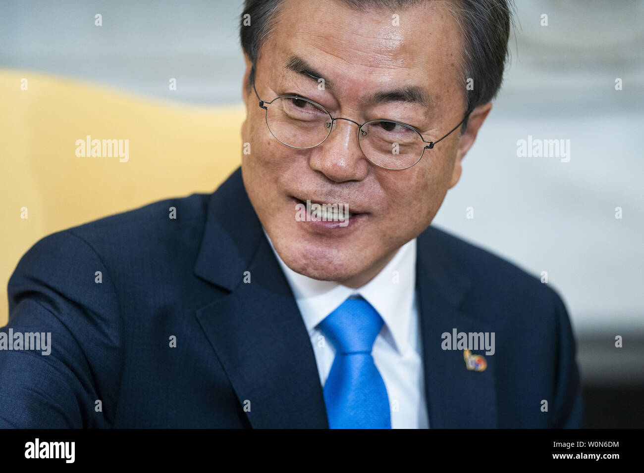 South Korean President Moon Jae-in listens to US President Donald J. Trump (not pictured) speak in the Oval Office of the White House White House in Washington on April 11, 2019. President Moon is expected to ask President Trump to reduce sanctions on North Korea in an attempt to jump start nuclear negotiations between North Korea and the US.  Photo by Jim Lo Scalzo/UPI Stock Photo