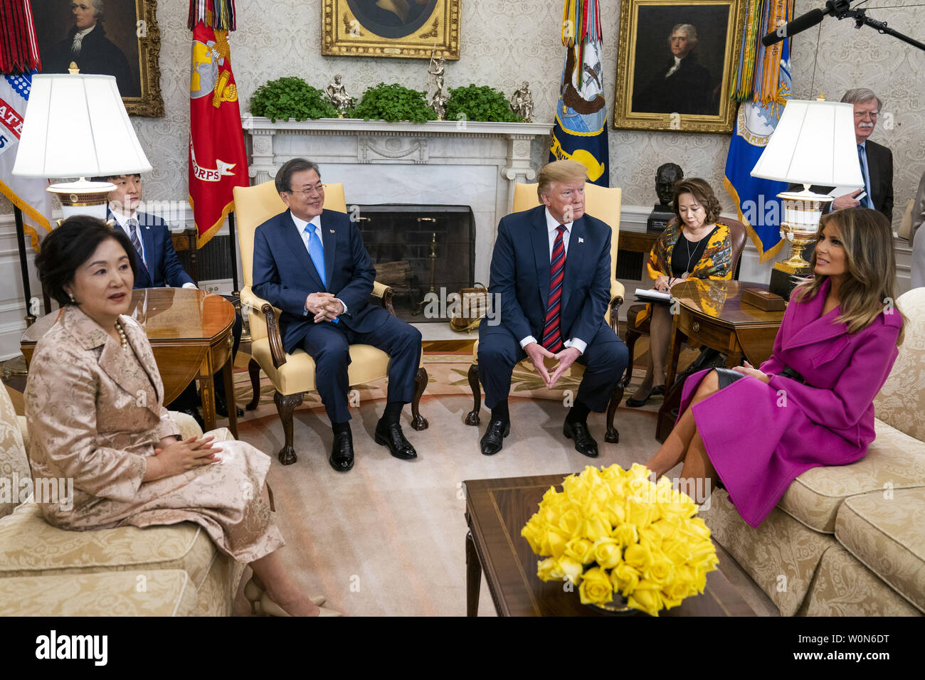 US President Donald J. Trump (C-R) welcomes South Korean President Moon Jae-in (C-L) to the Oval Office of the White House while Mrs. Kim Jung-sook (L) and US First Lady Melania Trump (R) look on in Washington on April 11, 2019. President Moon is expected to ask President Trump to reduce sanctions on North Korea in an attempt to jump start nuclear negotiations between North Korea and the US.  Photo by Jim Lo Scalzo/UPI Stock Photo