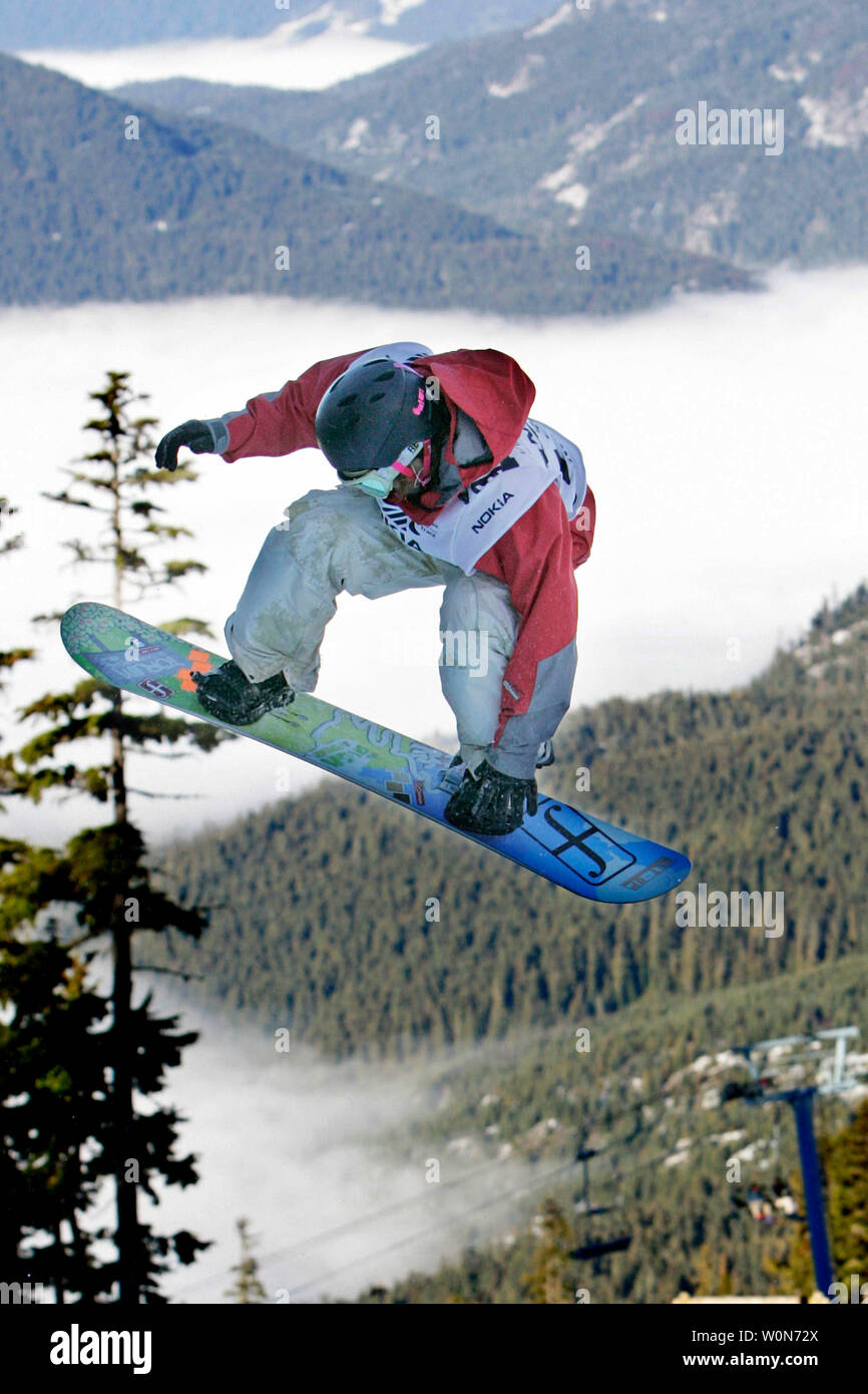 Fumiyuki Murakami of Japan spins a 720 backside in the men's halfpipe on  his final run in the Nokia FIS Snowboard World Cup at Whistler, BC on  December 11, 2005. Murakami was