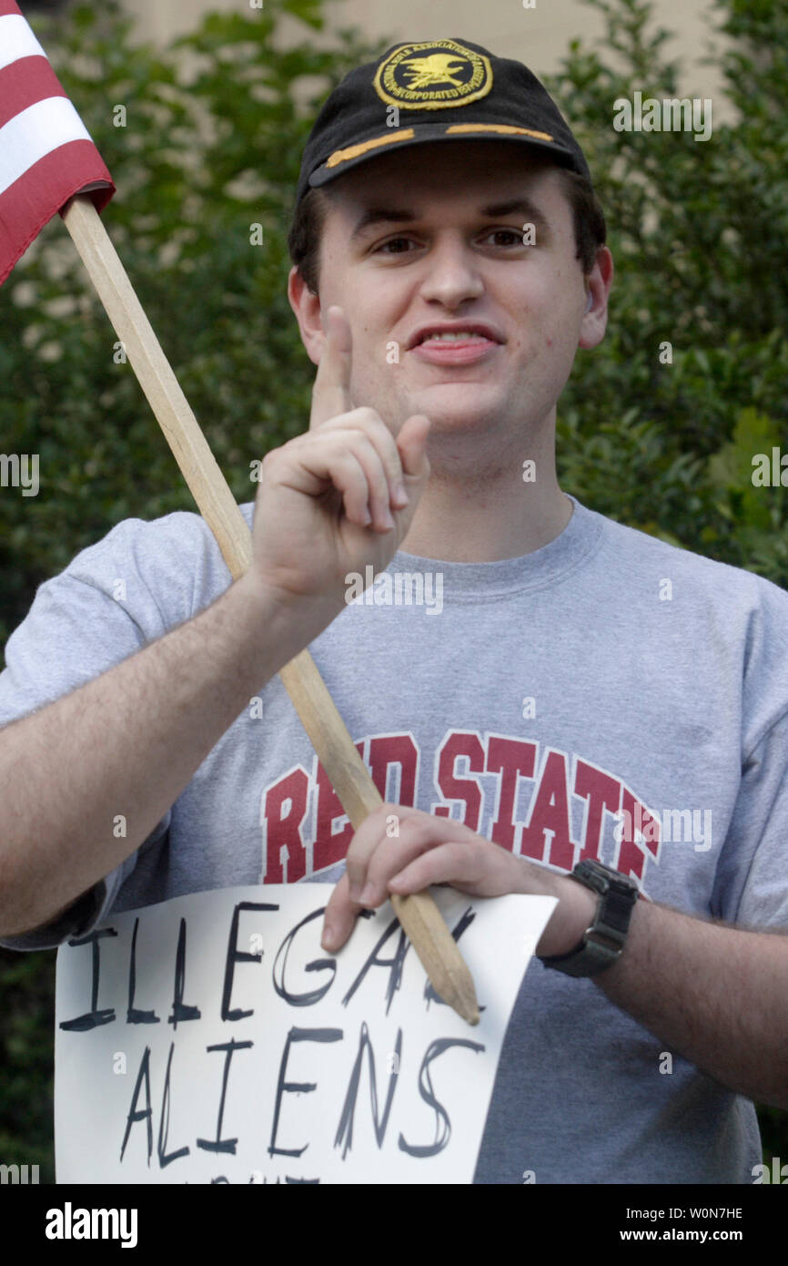 Tyler Joseph Froatz, 24, seen in a May 1, 2006 file photo during an immigration rally in Washington was arrested on assault charges during an immigration protest at Meridian Hill Park on May 1, 2007. Investigators who searched Froatz, found weapons in his possession and in his vehicle. Upon finding the weapons, the FBI's Joint Terrorism Task Force, D.C. police, and other officials searched of Froatz's Northwest Washington apartment on May 2, which turned up more than a dozen handguns and rifles, swords, knives, archery equipment, about 3.000 rounds of  ammunition, a Molotov cocktail, a hand gr Stock Photo