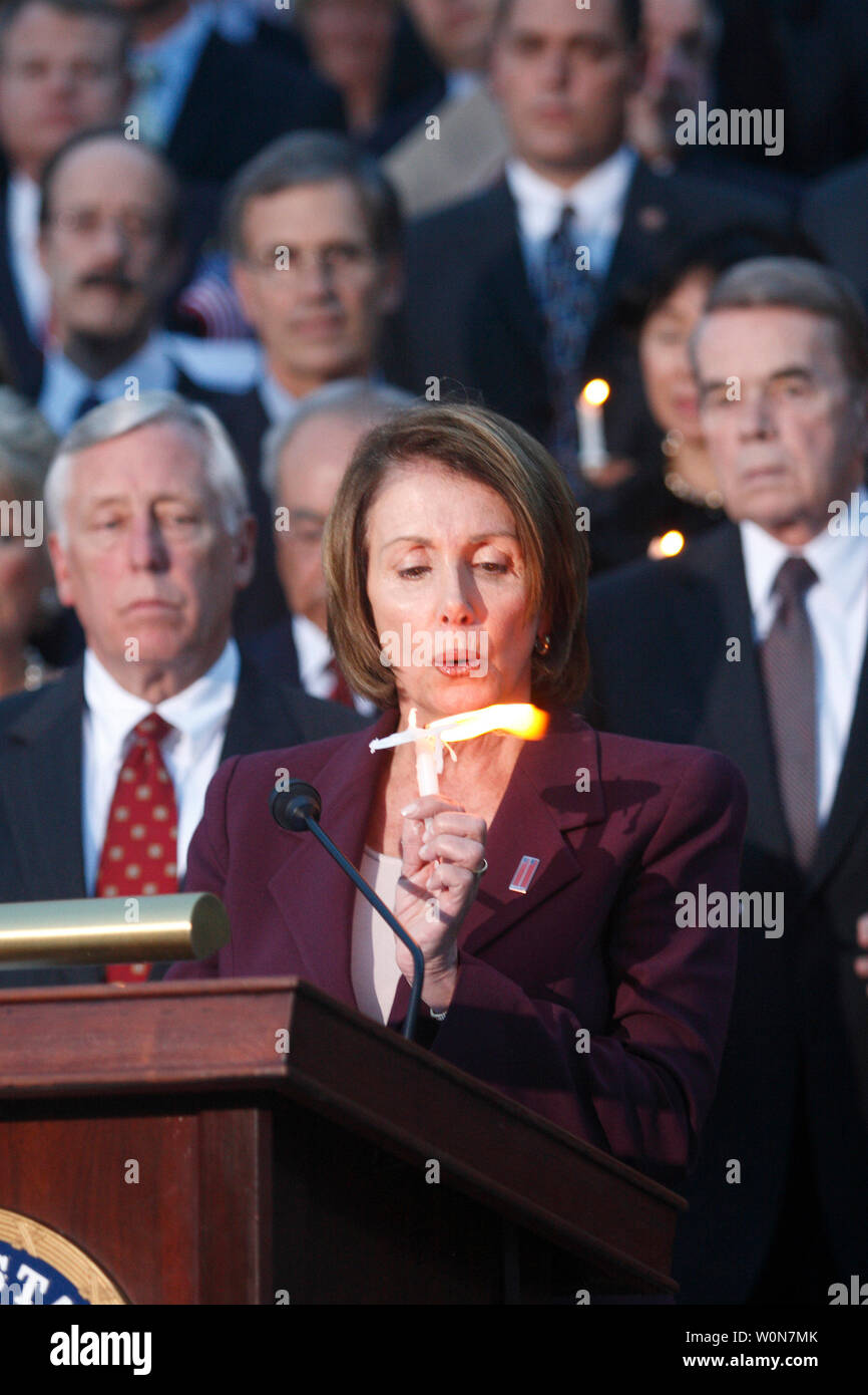 Speaker of the House Nancy Pelosi (D-CA) blows out a candle during September 11th Remembrance Ceremony on Capitol Hill in Washington on September 10, 2007. Members of Congress congregated to remember victims of September 11, 2001 when terrorists attacked Washington, DC and New York.  (UPI Photo/ Kamenko Pajic) Stock Photo