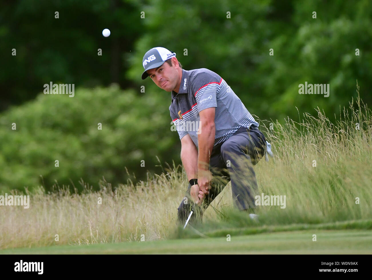 Louis Oosthuizen of South Africa hits from the rough at No. 3 during the final round of the 117th U.S. Open golf tournament at Erin Hills golf course on June 18, 2017, in Erin, Wisconsin. Photo by Kevin Dietsch/UPI Stock Photo
