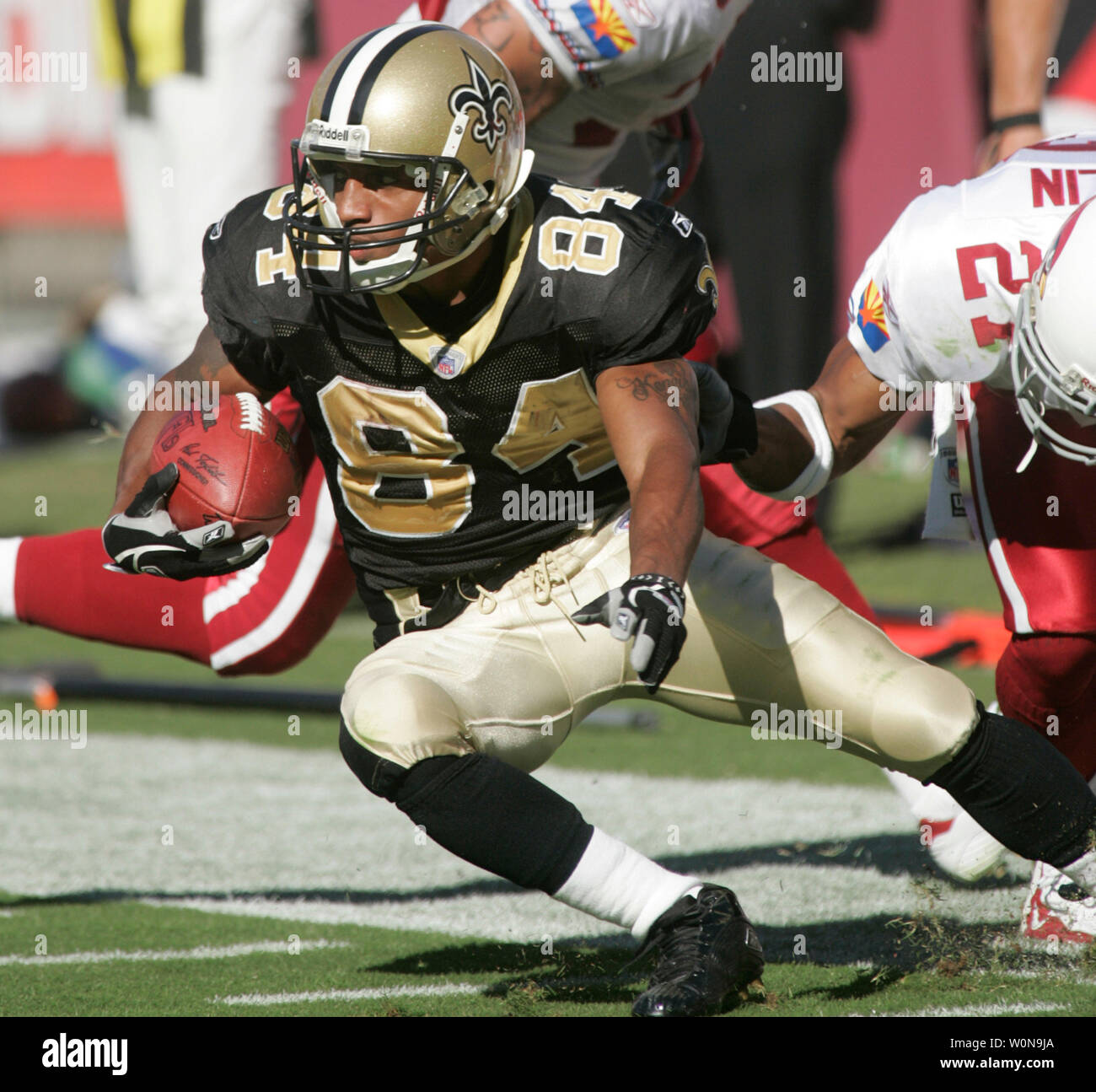 New Orleans Saints Michael Lewis (84) tries to get away from
