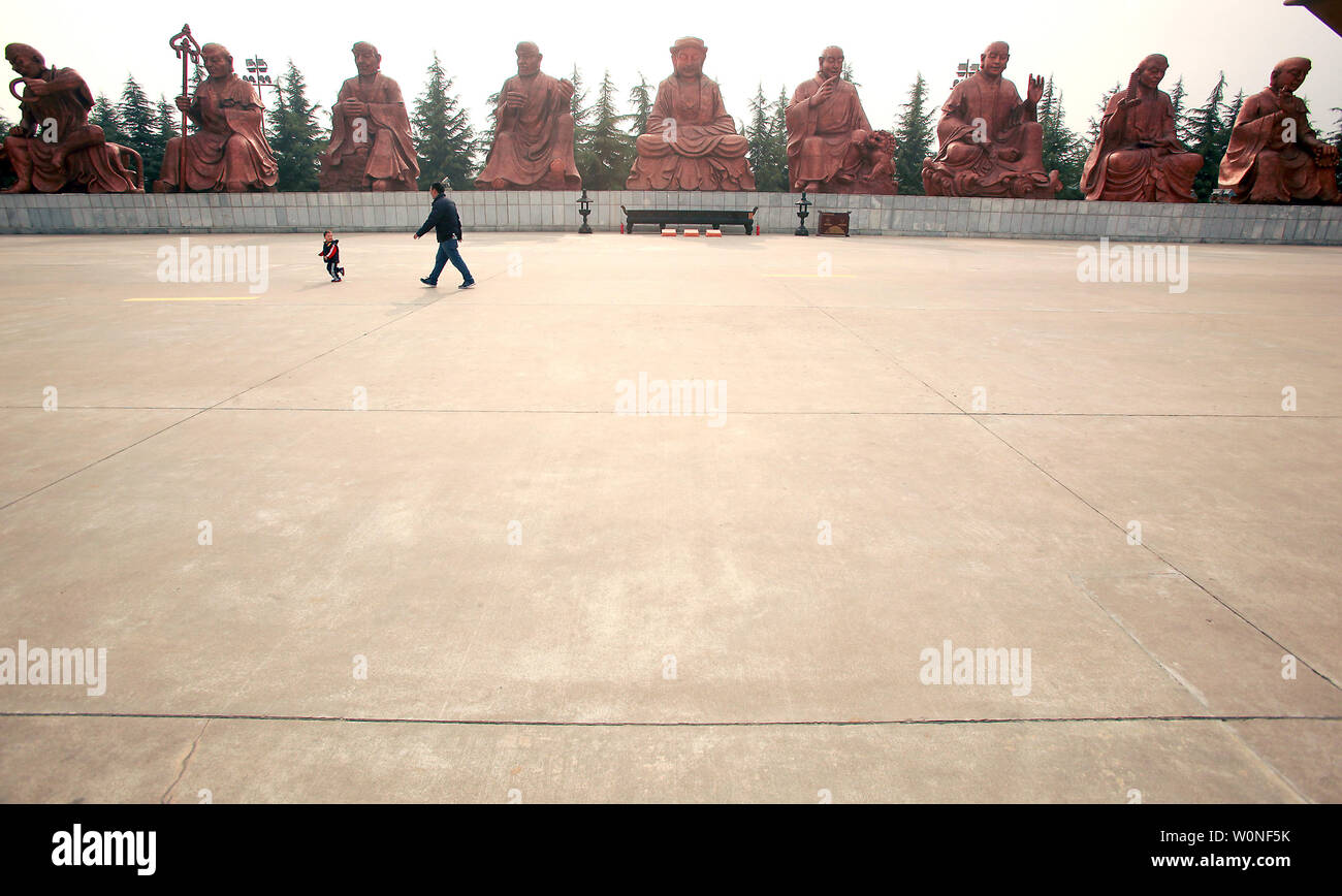 Chinese visit the Famen Temple Cultural Scenic Area, considered a 'Time-honored Buddhist Holy Land and Age-old Classic Buddhist Site,' in Famenzhen city in China's central Shaanxi Province on April 8, 2015.  The complex and temple enshrine the only relic of Sakyamuni's finger bone in the world.  The scenic area is the number two cultural symbol of Shaanxi, second only to the Terrat-Cotta Warriors.    Photo by Stephen Shaver/UPI Stock Photo