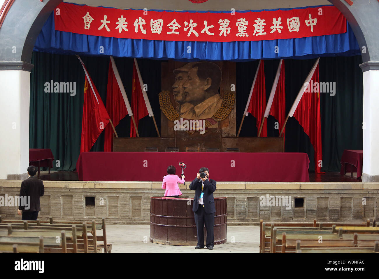 Chinese tourists visit the Central Auditorium on the revolutionary site of the Communist Party of China (CPC), led by former helmsman Mao Zedong, in Yangjialing city in Yan'an, Shaanxi Province on April 5, 2017.  Considered the 'Cradle of Chinese Revolution', Yan'an is where the Communists, led by Mao, established their main base after the Long March.      Photo by Stephen Shaver/UPI Stock Photo