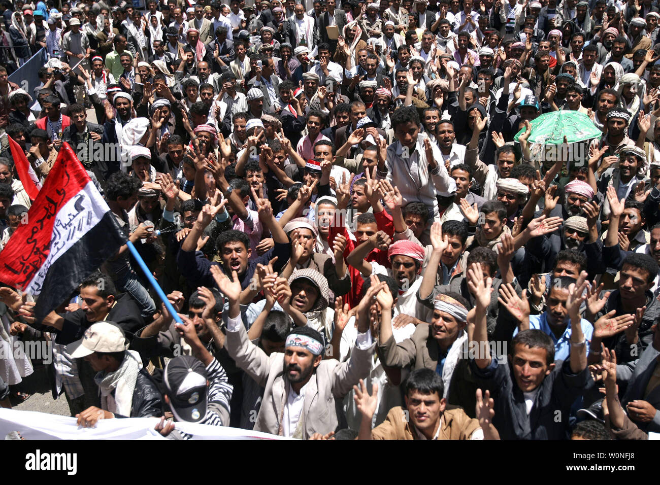 Yemeni anti-government protesters shout slogans during a demonstration demanding the resignation of Yemeni President Ali Abdullah Saleh in the capital Sanaa, Yemen, on April 3,2011. UPI/Mohammed Abdallah Stock Photo