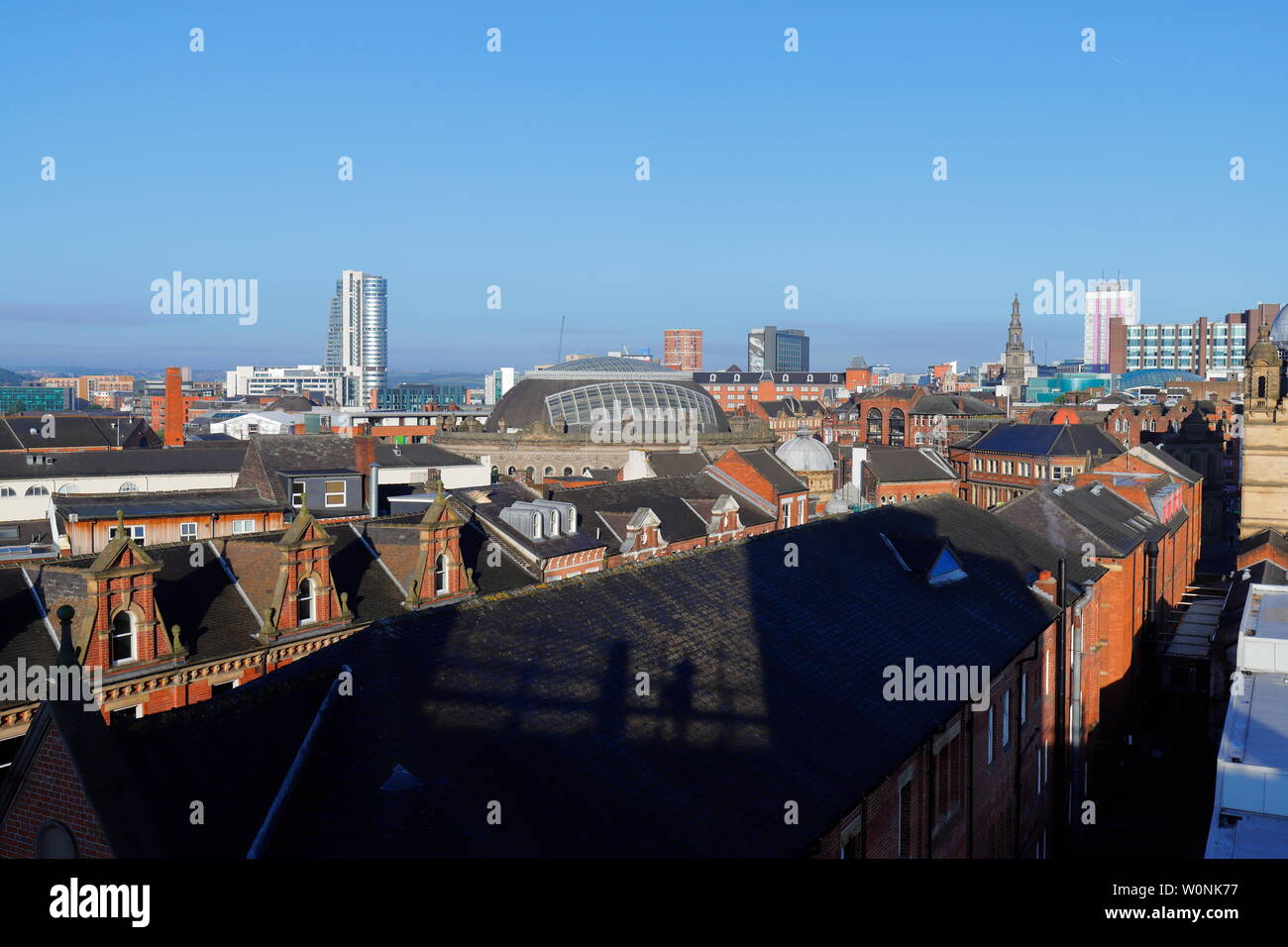 A view across Leeds City Centre from the roof top of a multi storey car