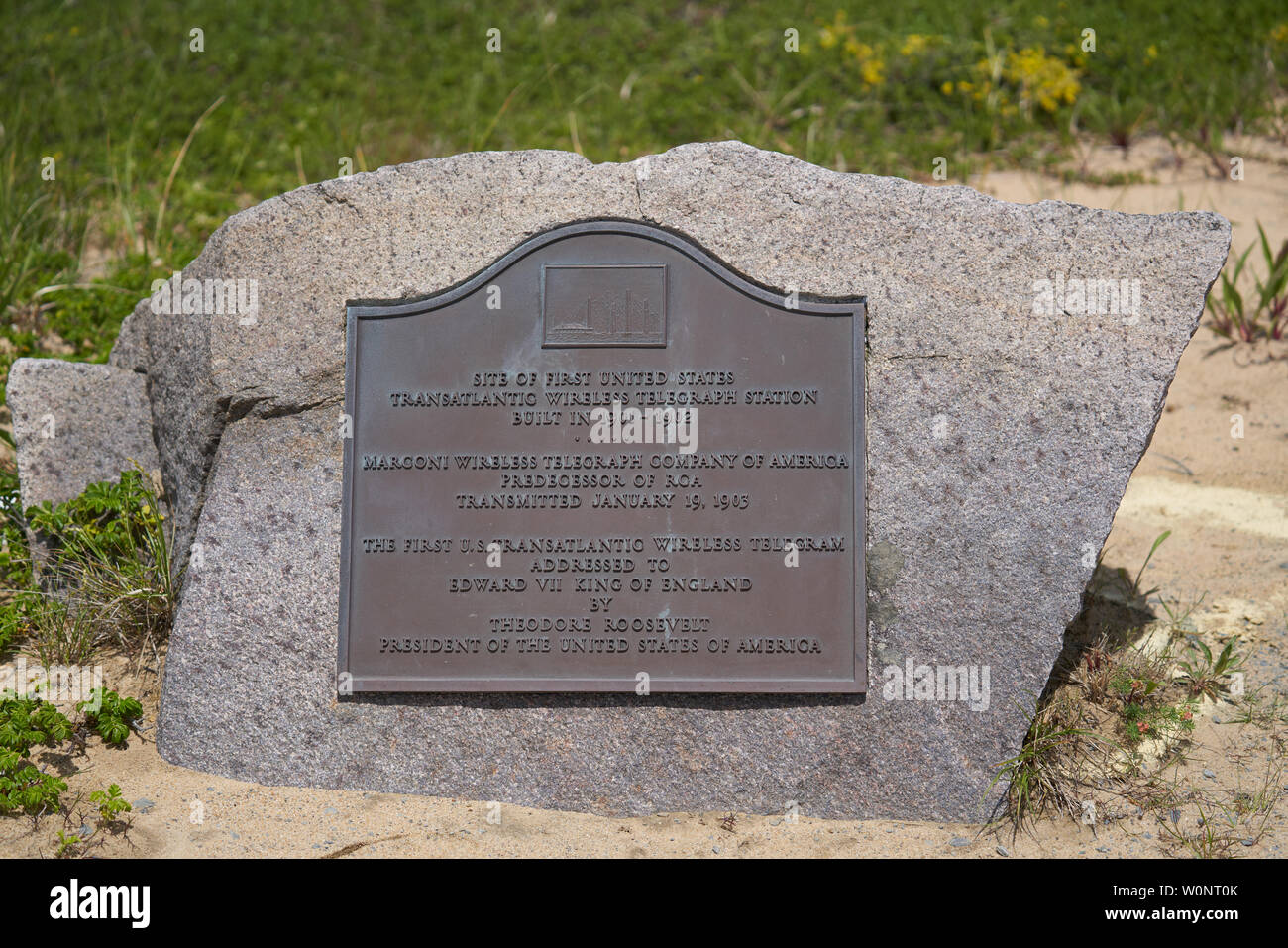 South Wellfleet, MA - June 12, 2019: This bronze plaque commemorates the site of the first US Transatlantic wireless telegraph station by Marconi Wire Stock Photo