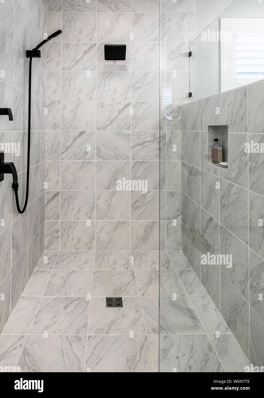 Luxury Wheelchair Accessible Shower With Marble Floor And