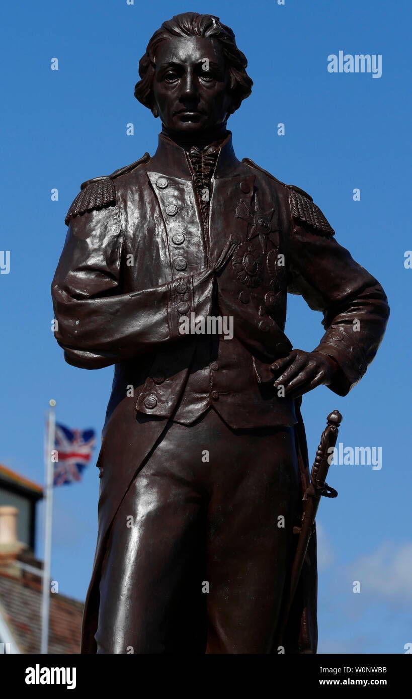 AJAXNETPHOTO. 3RD JUNE, 2019. SOUTHSEA, ENGLAND. - TRAFALGAR HERO - BRONZE STATUE OF BATTLE OF TRAFALGAR COMMANDER ADMIRAL HORATIO NELSON NEAR GRAND PARADE, OLD PORTSMOUTH. STATUE WAS CENTRE OF A DISPUTE BETWEEN PORTSMOUTH COUNCIL AND PROTESTORS AGAINST MOVING IT FROM ITS ORIGINAL LOCATION NEAR SOUTHSEA COMMON CLOSER TO THE SEA. PHOTO:JONATHAN EASTLAND/AJAX REF:GX8 190306 373 Stock Photo