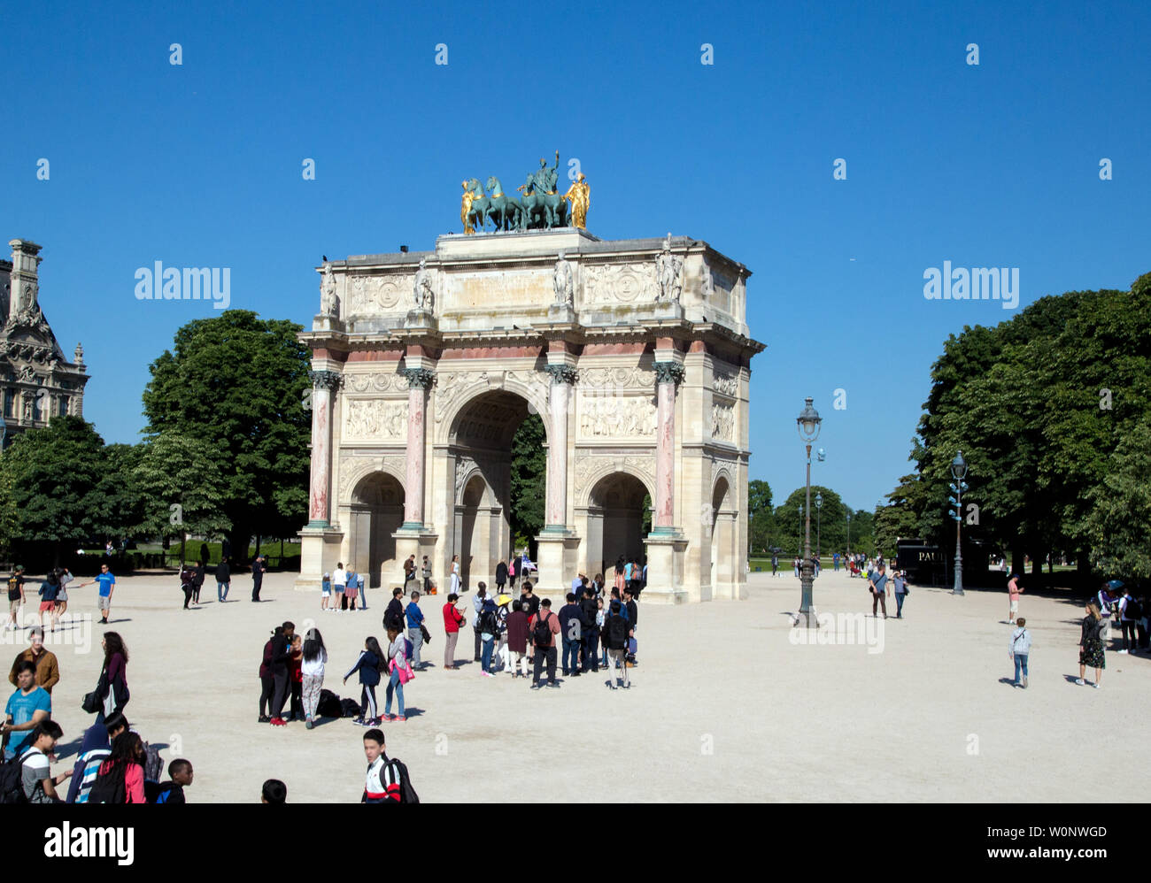 The Arc de Triomphe du Carrousel across from the Louvre in Paris France  The Corinthian style architecture commemorate Napoleon's military victories Stock Photo