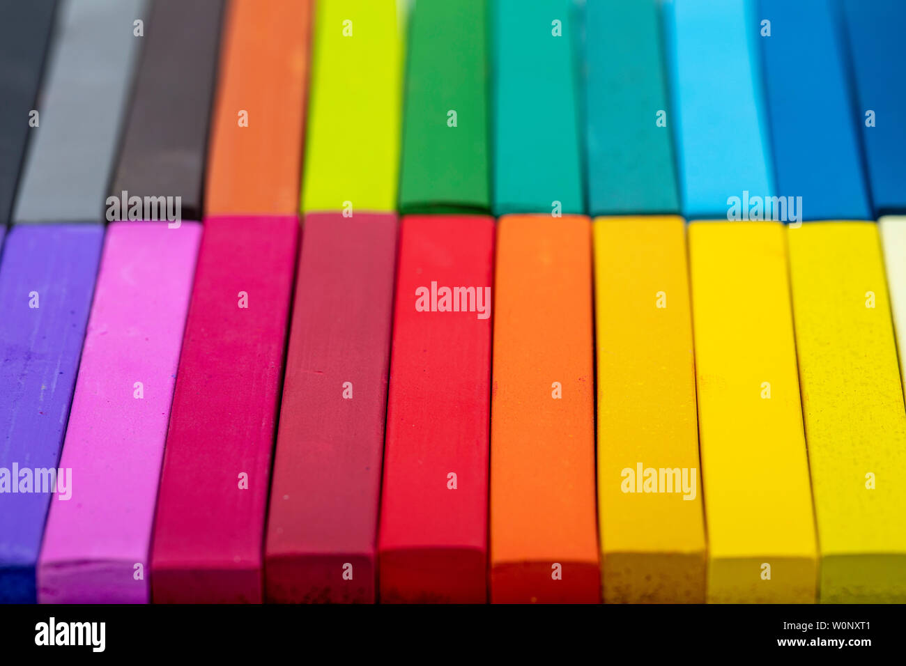 Colored chalks. Square colorful pastel chalks tops closeup, on white ...