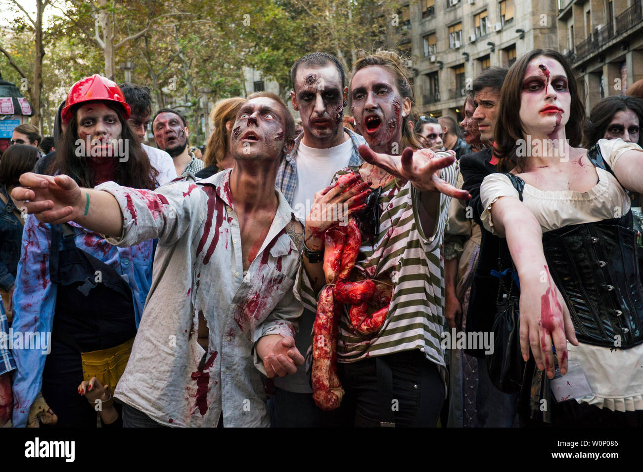 Belgrade, Serbia - October 20, 2012: People masked as zombies parades on streets during a zombie walk. Zombie walk is organized before Serbian SF movi Stock Photo