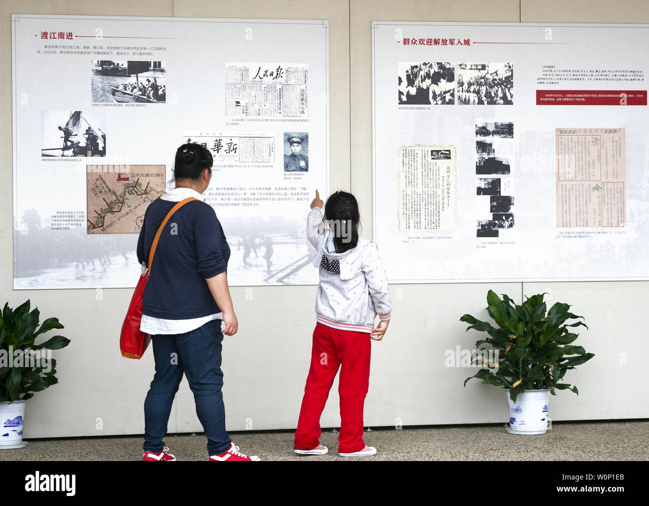On April 23, 2019, Nanjing, under the guidance of the Propaganda Department of the Nanjing Municipal Committee of the Communist Party of China and sponsored by the Nanjing Veterans Affairs Bureau and the Nanjing Yuhuatai Martyrs Cemetery, celebrated the 70th anniversary of the liberation of Nanjing ----The oral historical facts exhibition of some veterans participating in the liberation of Nanjing was held at the main peak tablet gallery of the Yuhuatai martyrs cemetery in Nanjing, attracting many visitors. Stock Photo