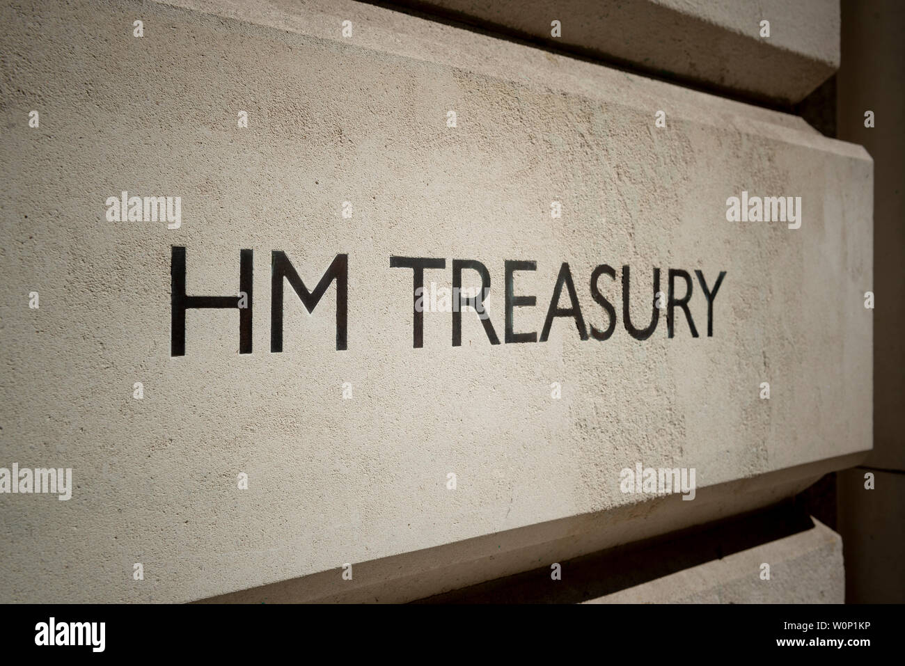 Signage for HM Treasury building located on Horse Guards Road in London, UK. Stock Photo