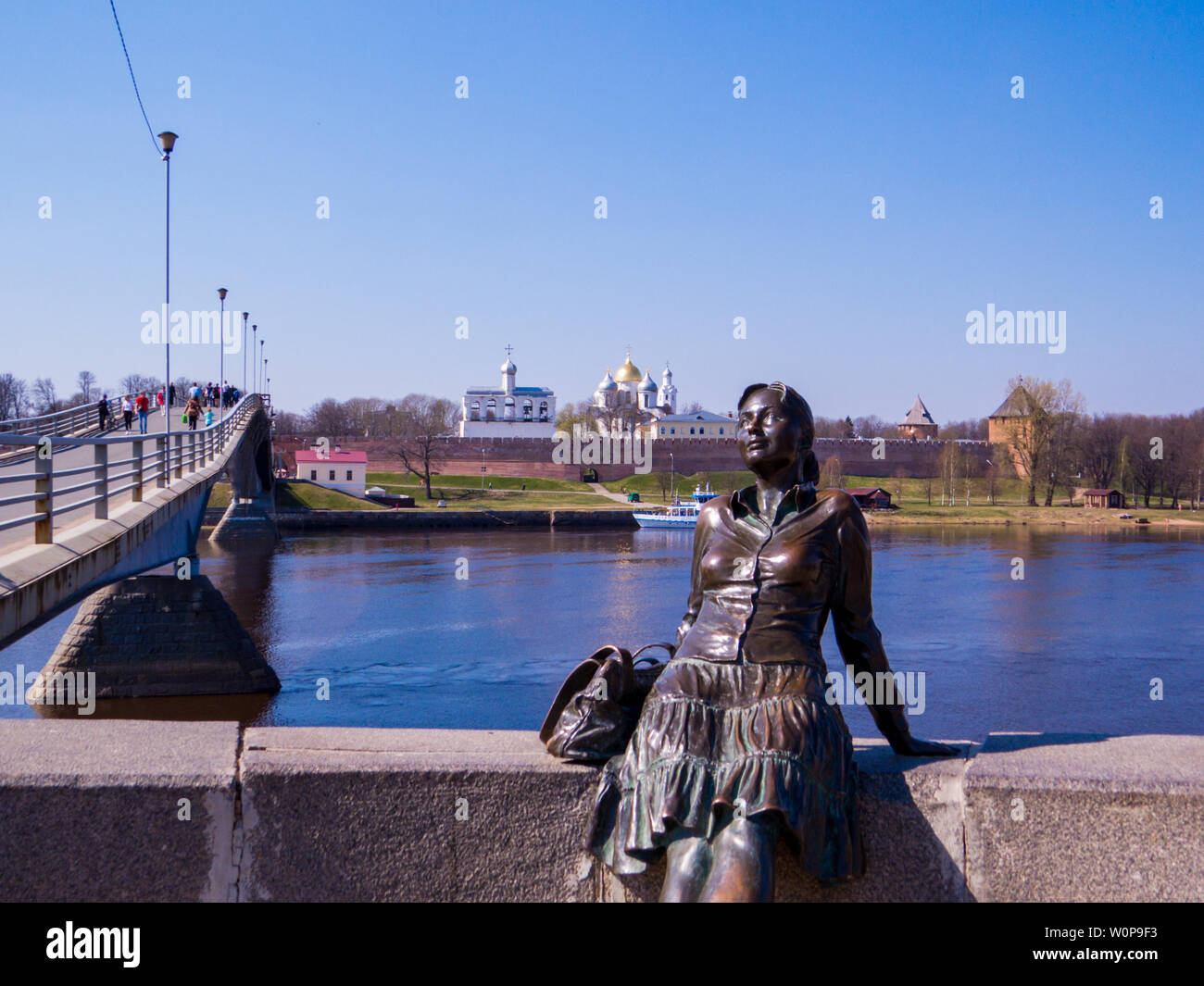 VELIKY NOVGOROD, RUSSIA - APRIL 24, 2019: View of the Girl-Tourist monument on the embankment of the Volkhov River. Stock Photo