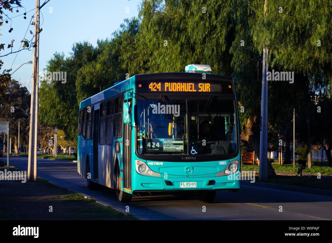 SANTIAGO, CHILE - MAY 2017: Transantiago bus during sunset Stock Photo