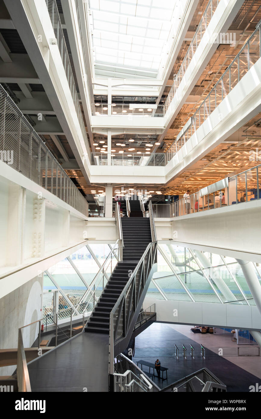 Herzogenaurach, Germany. 26th June, 2019. Modern architecture characterises  the new "Arena" office building of the sporting goods manufacturer "adidas".  In the 70th year of its existence, the sporting goods manufacturer moved  into