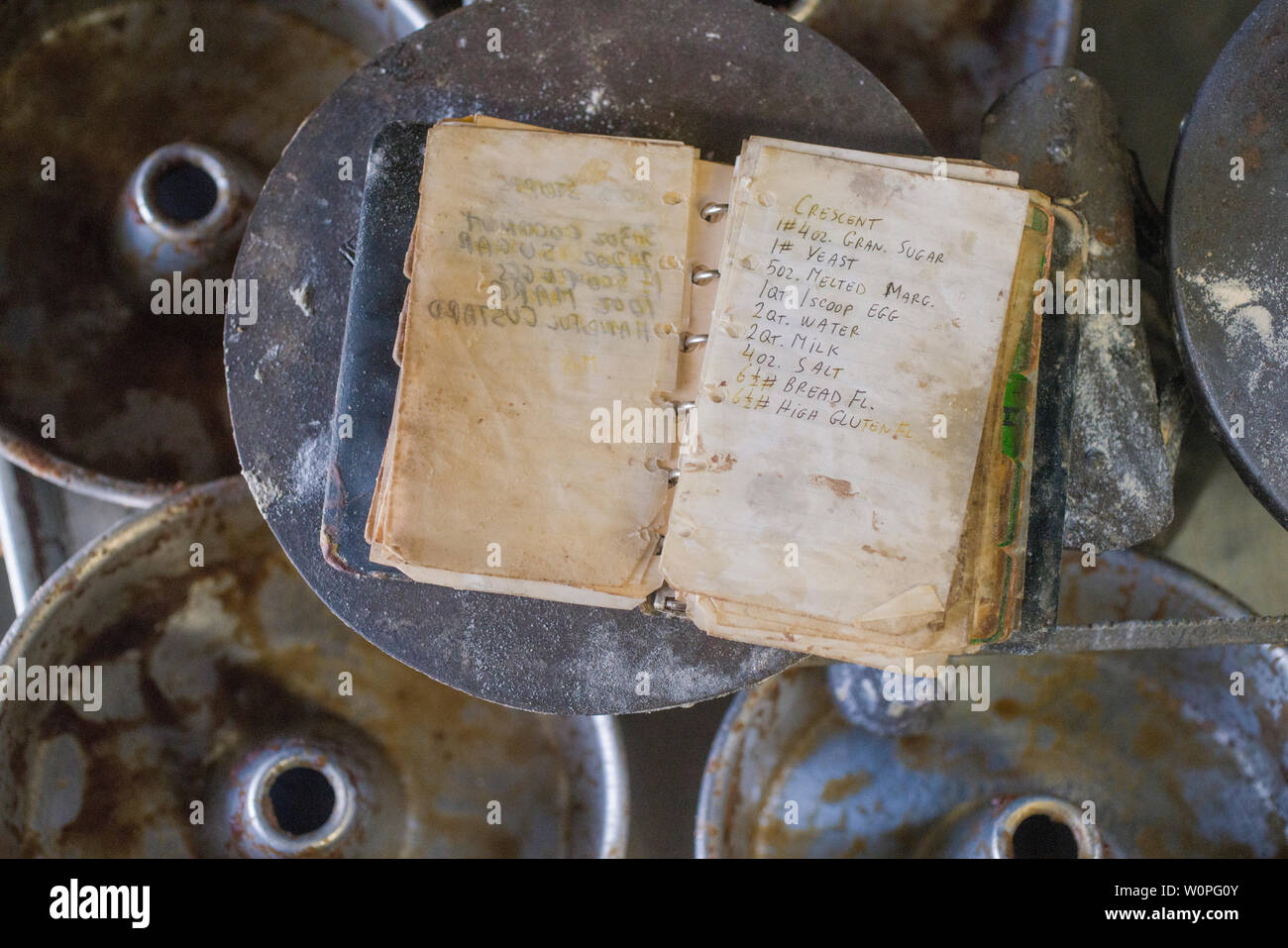 old recipe book open on a scale in a kitchen Stock Photo
