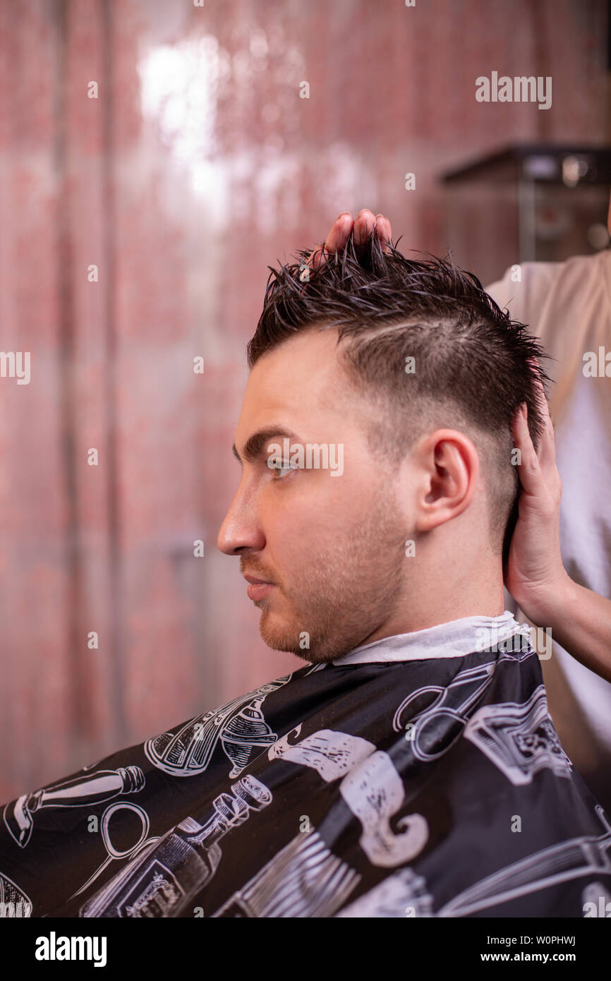 Gel hair barber hires stock photography and images Alamy