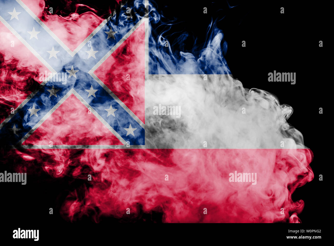 The national flag of the US state Mississippi in against a gray smoke on the day of independence