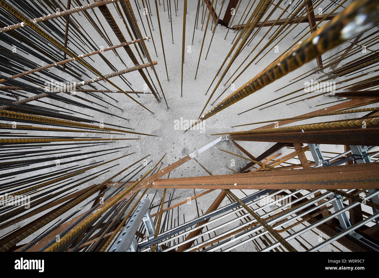 Reinforced steel bars on the base for the first reactor at Hinkley Point C power station near Bridgwater, Somerset, as it is filled with the UK's largest ever concrete pour, around 9'000M3. Stock Photo