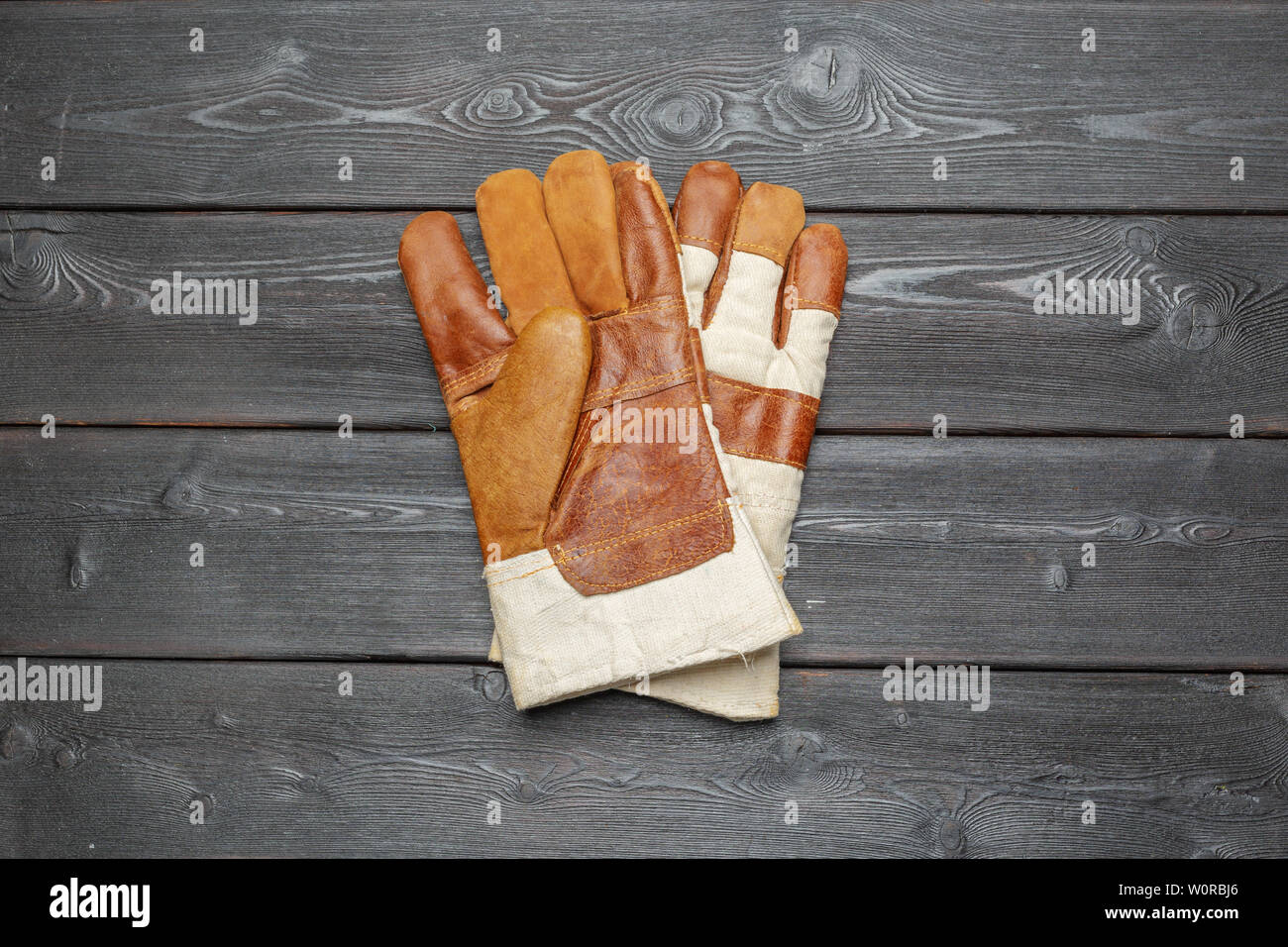 Leather gloves on table hi-res stock photography and images - Alamy