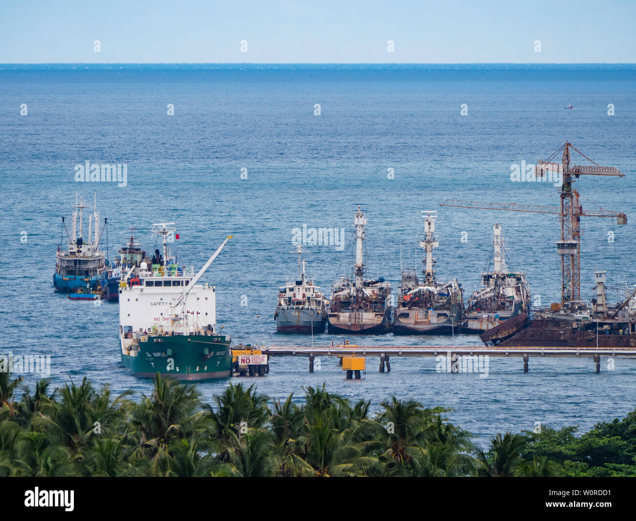 General Santos City, The Philippines - May 22, 2019: Ocean going tuna vessels with the characteristic watchtowers at a jetty in General Santos City, t Stock Photo