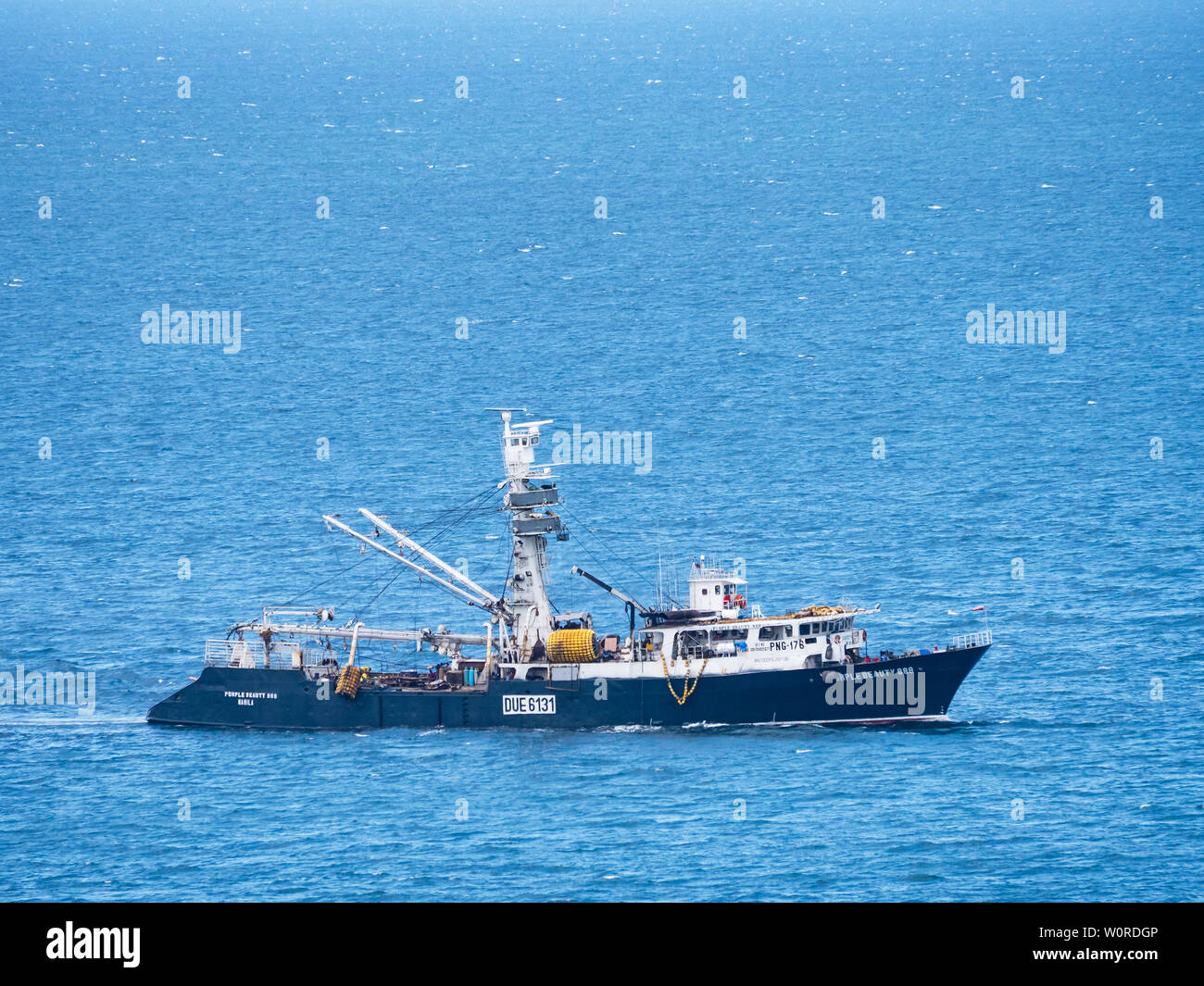 General Santos City, The Philippines - May 22, 2019: Ocean going tuna vessel with the characteristic watchtower off the coast of General Santos City, Stock Photo