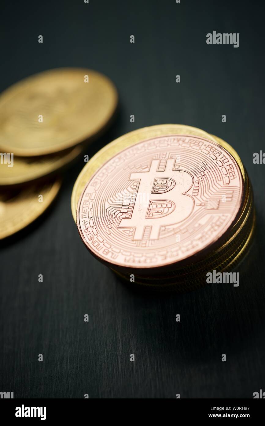Bitcoins on a wood table. Stock Photo
