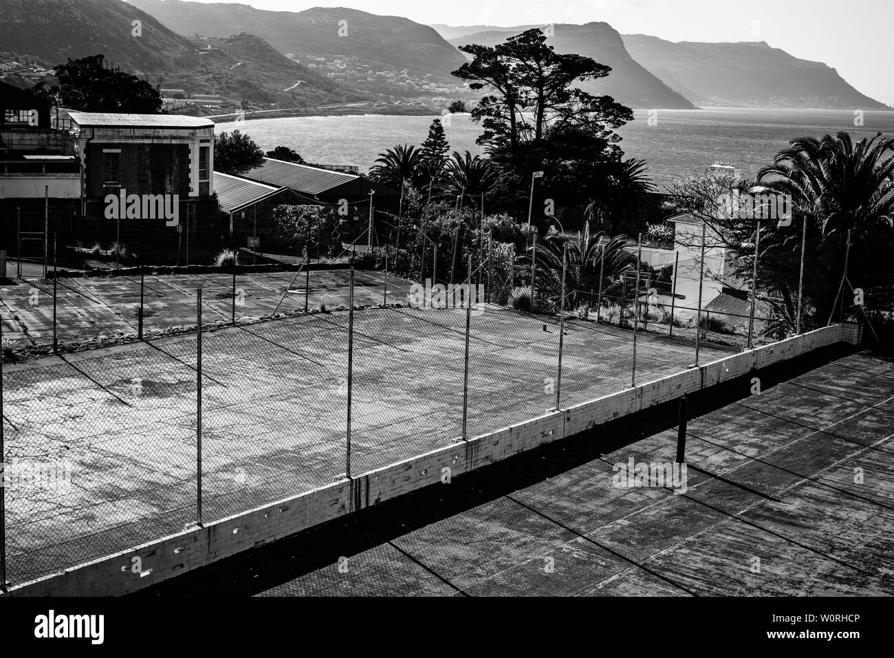 The neglected Simons Town tennis courts on South Africa's False Bay coastline near Cape Town Stock Photo