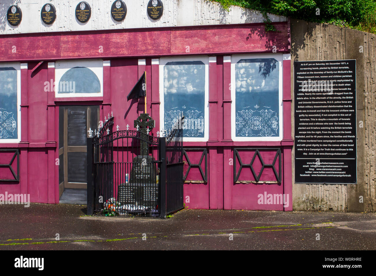 17 June 2019 The Memorial Facade and Celtic cross on the site of McGurk's Bar where 15 people were murdered in a bomb atrocity perpetrated by the UVF Stock Photo