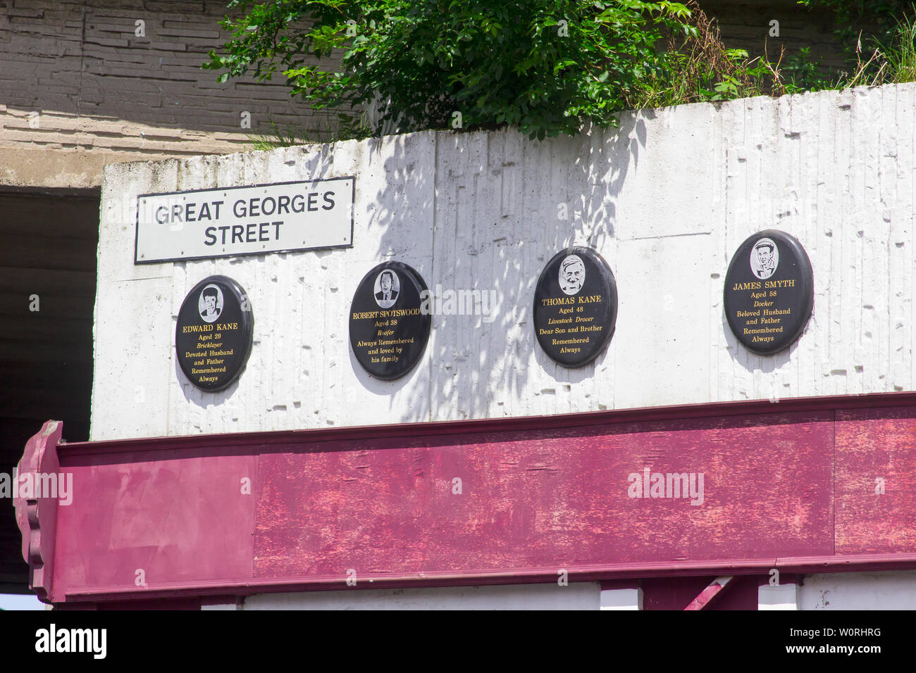 17 June 2019 Memorial Plaques at the scene of the McGurk's Bar Atrocity  where 15 people were murdered in a bomb atrocity perpetrated by the protestan Stock Photo
