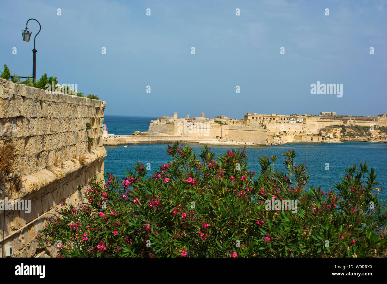 Panorama view from Fort Almo peninsula fortress in Valletta across to the Grand Harbour and sea Stock Photo