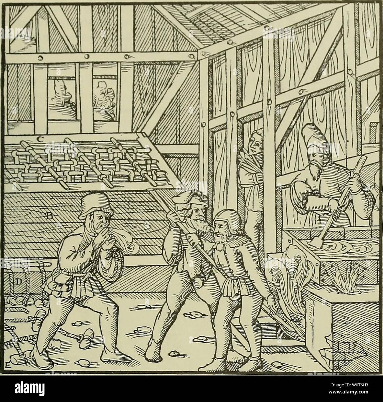 Archive image from page 612 of De re metallica (1950). De re metallica deremetallica50agri Year: 1950  BOOK XII.    A—Caldron. B—Tank. C—Cross-bars. D—Ropes. E—Little stones. By the third method vitriol is made out of melanteria and sory. If the mines give an abundant supply of melanteria and sory, it is better to reject the chalcitis, and especialty the misy, for from these the vitriol is impure, particularly from the misy. These materials having been ,dug and thrown into the tanks, they are first dissolved with water ; then, in order to recover the pyrites from which copper is not rarely sme Stock Photo