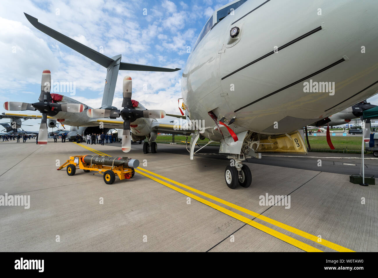 BERLIN, GERMANY - APRIL 25, 2018: Maritime patrol aircraft Lockheed P-3C Orion and lightweight antisubmarine torpedo Mark 46, Mod 5 in the foreground. German Navy. Exhibition ILA Berlin Air Show 2018. Stock Photo